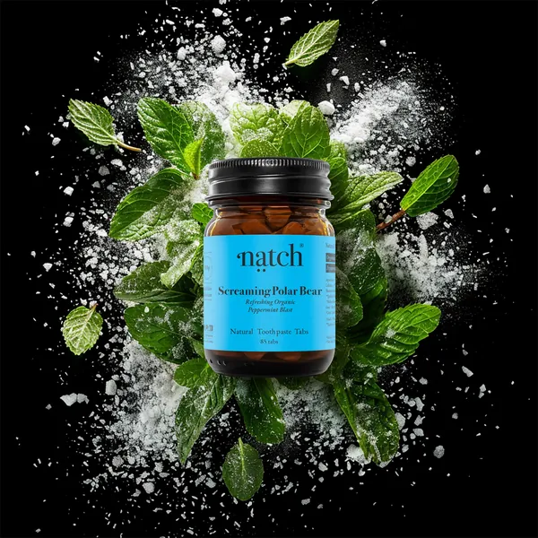 Screaming Polar Bear bottle with mint leaves on a dark background
